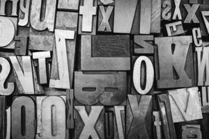 bunch of metal type press